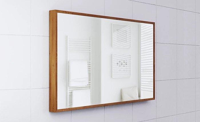 Wood-framed mirror bathroom TV on a white tiled wall.